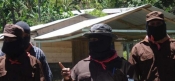 La Caravana Nacional e Internacional en su rrecorrido por el Caracol 3 La Garrucha